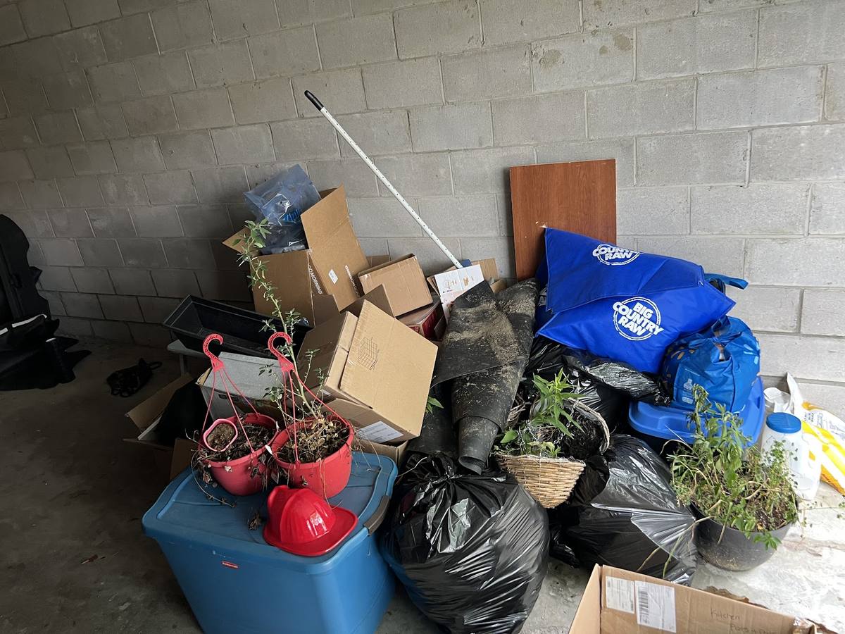 Bags and household items gathered for junk removal