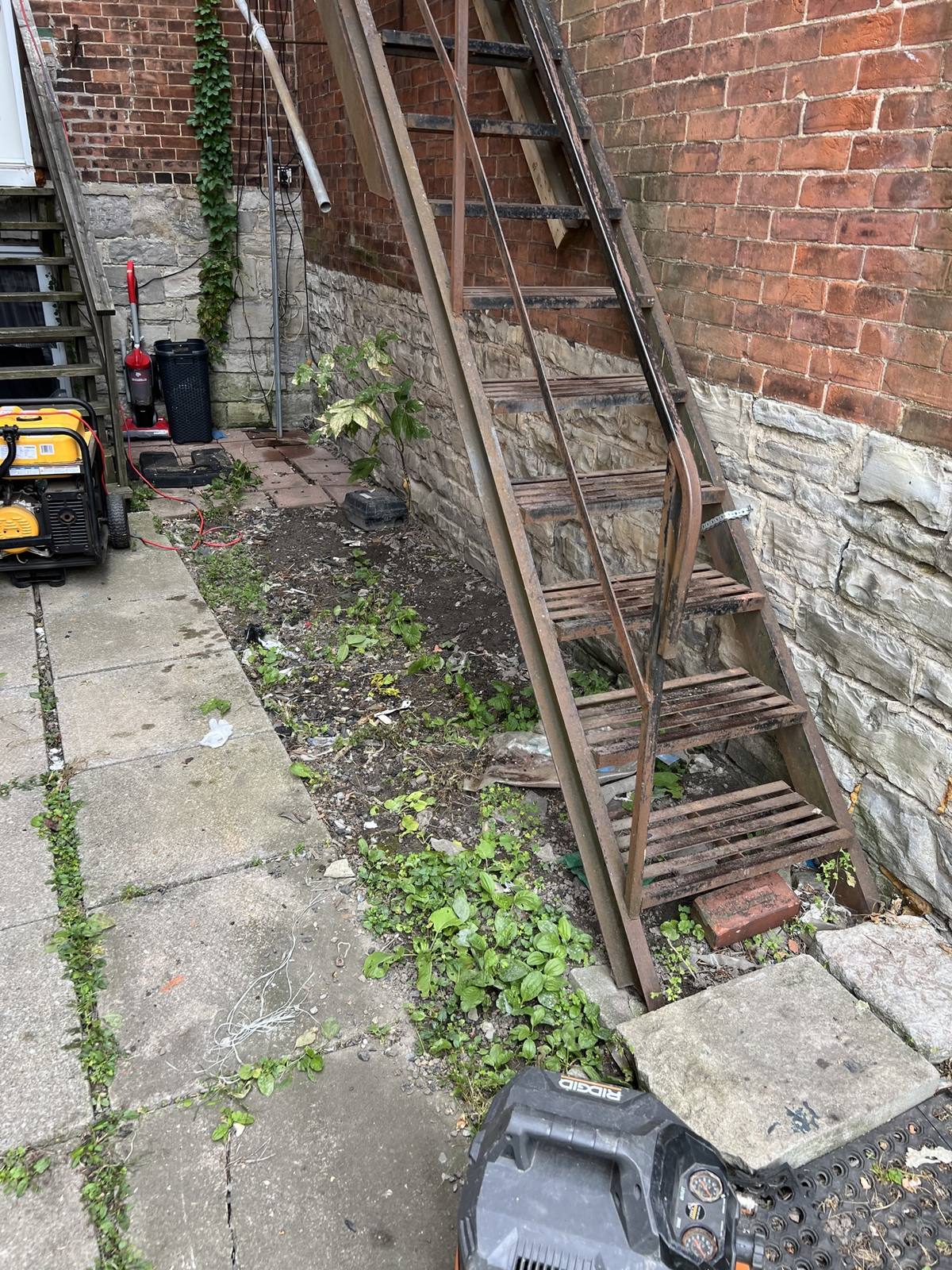 Stairs area cleared after junk removal